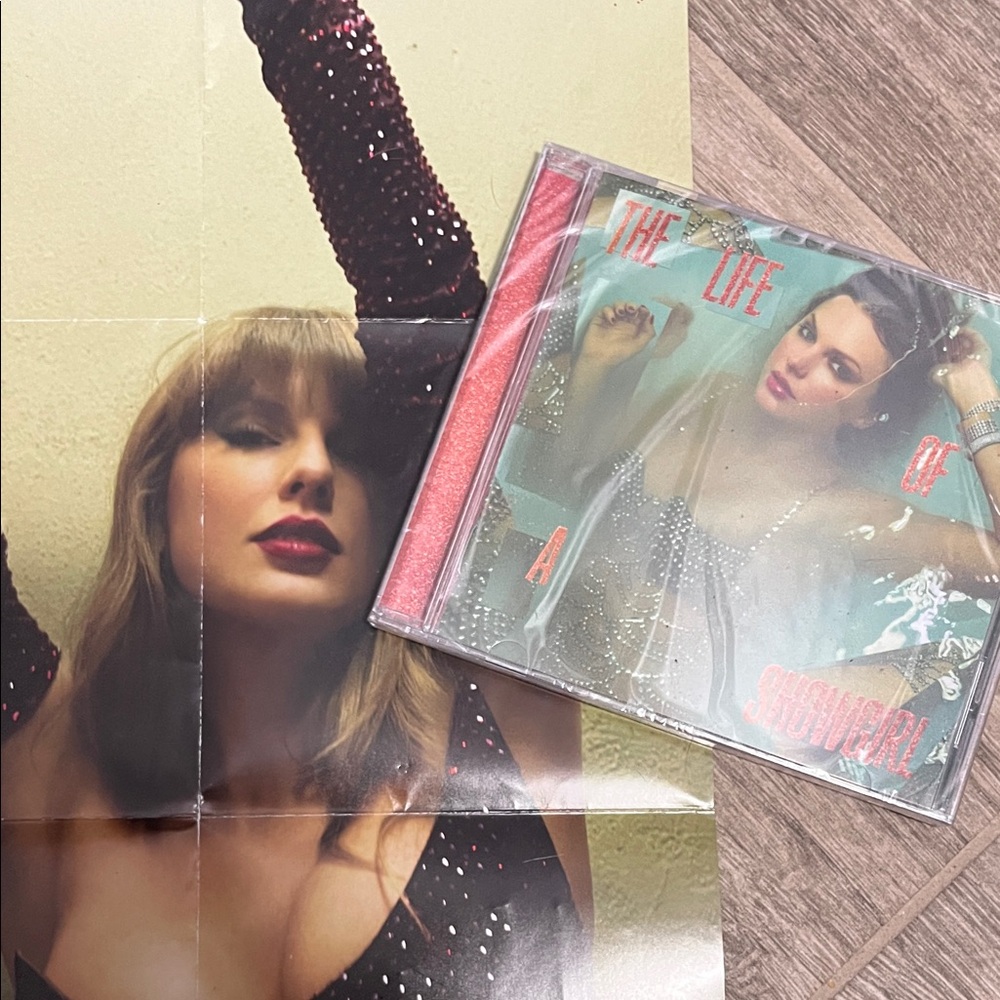 The Life of a Showgirl CD— unopened, includes poster from other CD